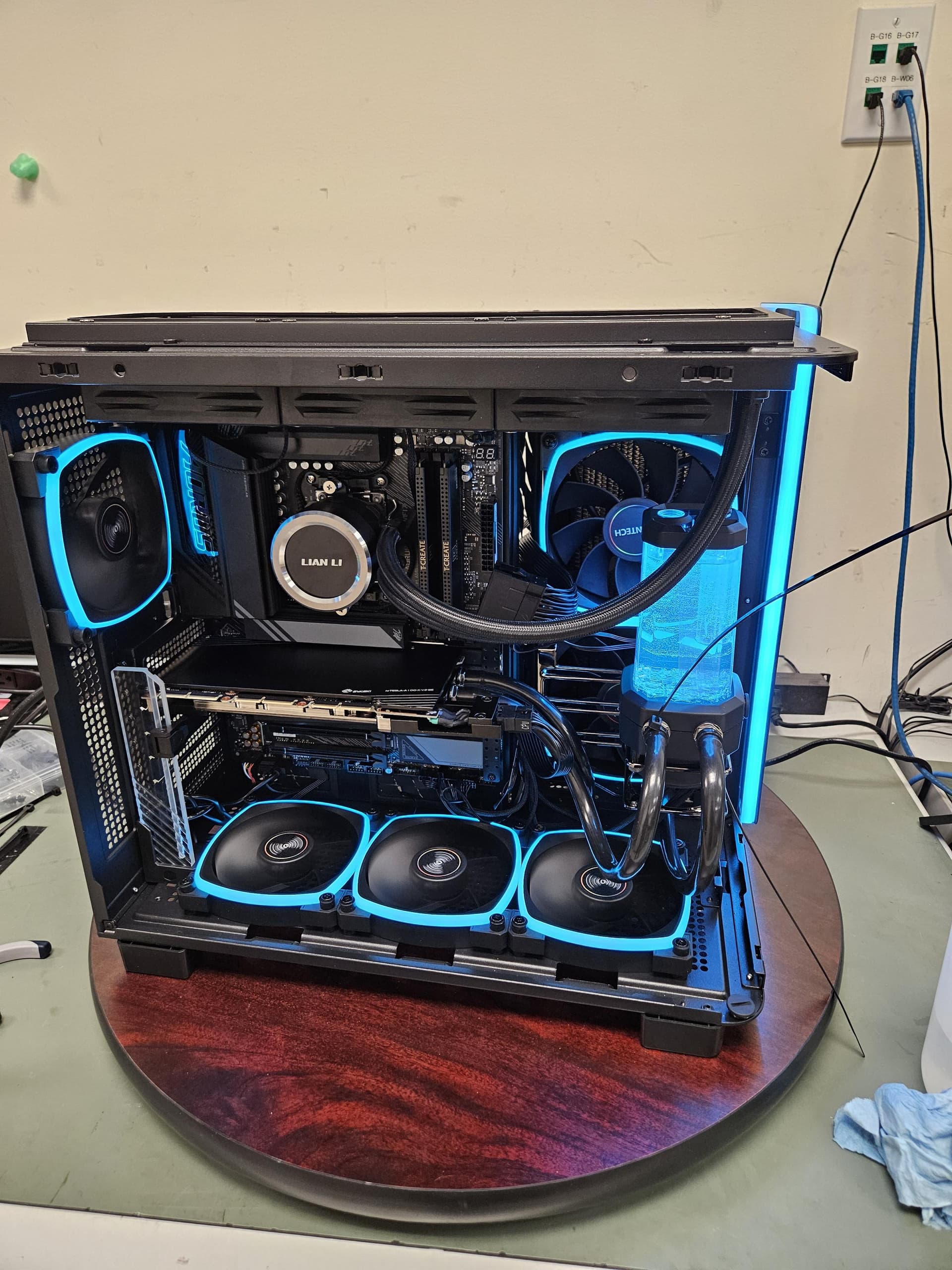 A clean white PC build with custom lighting.