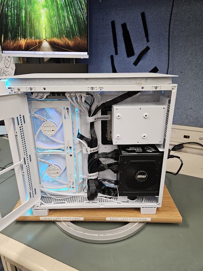 A sleek custom PC with blue and white lighting.